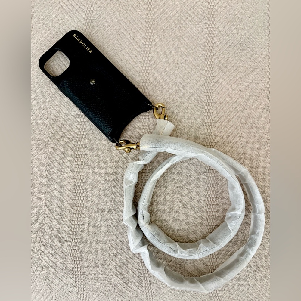 Bandolier Black Leather Phone Case with Gold Hardware and White Strap